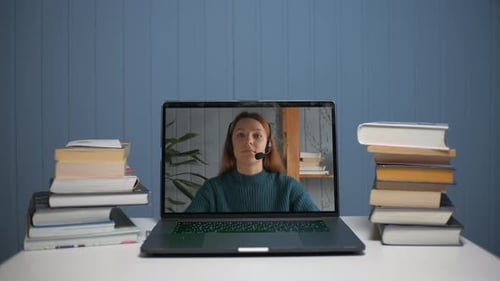 Laptop Displaying Woman During Online Class