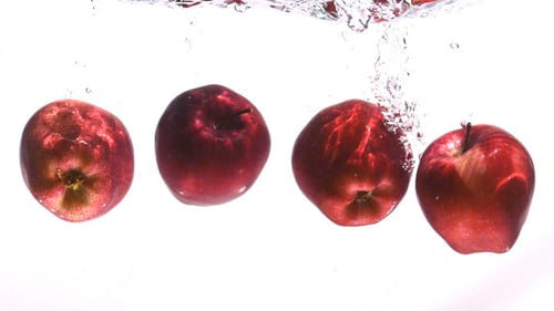 Apple Dropping In Water