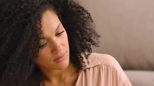 Woman Plays Guitar and Sings Indoors