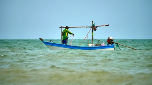 Fischer auf dem Boot