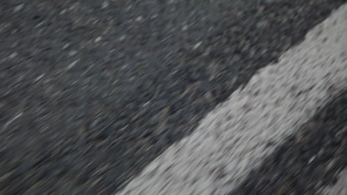 Asphalt Road With White Stripes