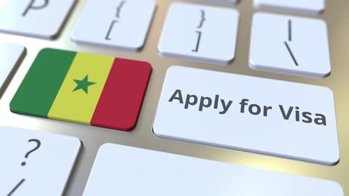 Senegal Visa Application Button Press on Modern Keyboard