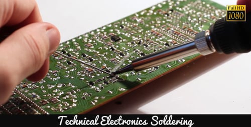 Close Up of Soldering Iron on Circuit Board