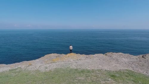Aerial Alone Man and Sea