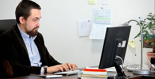 Businessman Working on the Computer in the Office