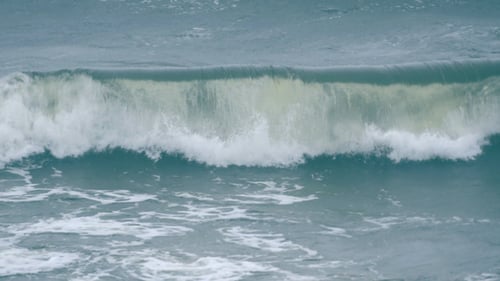 Ocean Waves Crashing Along the Shoreline During Daytime