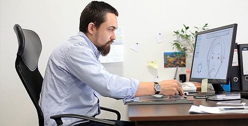 Man Creates Digital Art Using Graphic Tablet