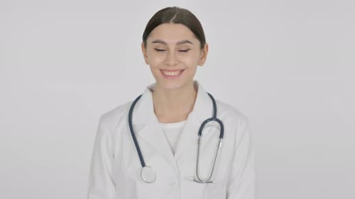 Friendly Woman Doctor Smiling in White Coat
