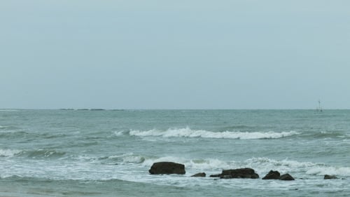 Ocean Waves Rolling on a Rocky Beach