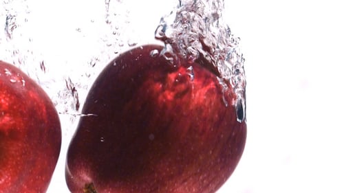 Apple Drop Into Water