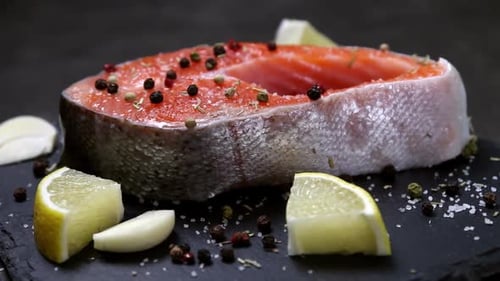 Fresh Salmon Steak with Lemon, Garlic and Pepper