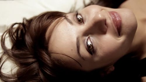 Woman Relaxing, Opening Eyes on Pillow Close Up