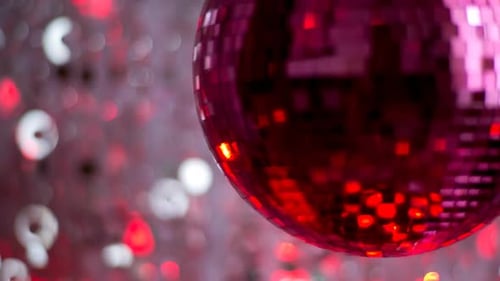 Rotating Disco Ball with Bokeh Background