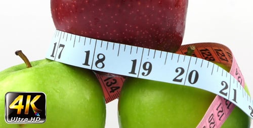 Apples Stacked with Measuring Tape