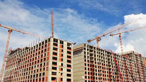Working Construction Cranes
