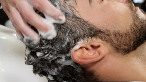 Man getting his hair wash