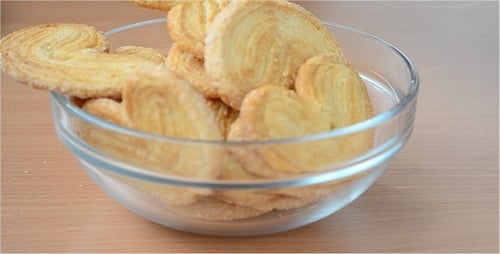 Heart-Shaped Cookies Poured Into Clear Glass Bowl