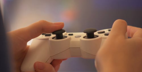 Hands Holding Video Game Controller Playing Game