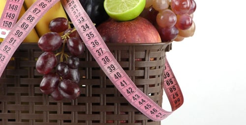 Fruit Basket with Measuring Tape on White