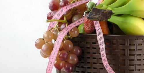 Fresh Fruit with Tape Measure for Healthy Eating