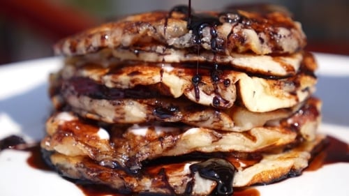 Pancakes Stack Drizzled with Delicious Chocolate Syrup