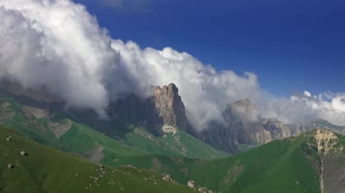 Dramatic Mountain Landscape with Rolling Clouds
