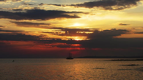 Sunset With Clouds Over Sea