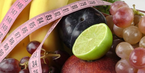 Fresh Fruit and Tape Measure Close Up