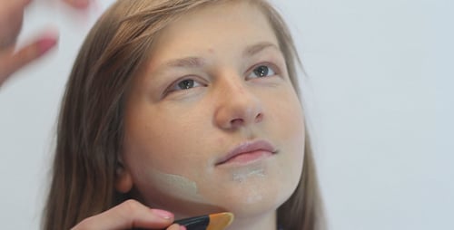Applying Foundation with Brush for Cosmetics and Beauty