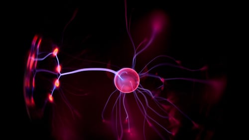 Plasma Globe Emitting Electric Strands on Black