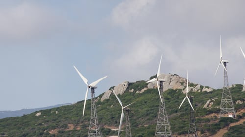 Wind Turbines on a Green Hillside