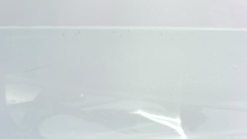 Fruits Dropping Into Water with Splash and Bubbles