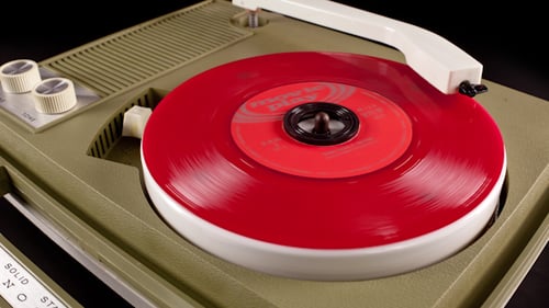 Retro Record Player Spins Red Vinyl