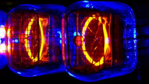 Nixie Tubes Showing Numbers on Dark Background