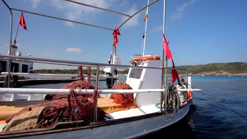 Fishing Boat Docked on a Sunny Day