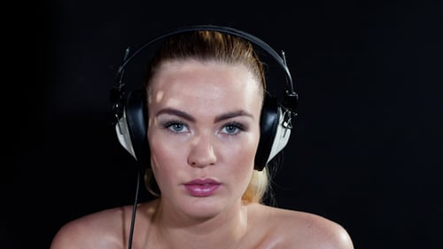 Blonde Girl Dances Headphones
