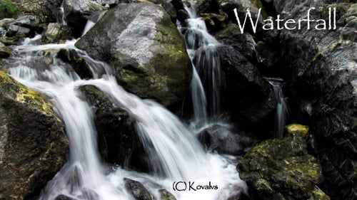 Waterfall Cascading Through Rocks in a Natural Setting
