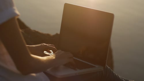 Laptop Use at Sunrise or Sunset