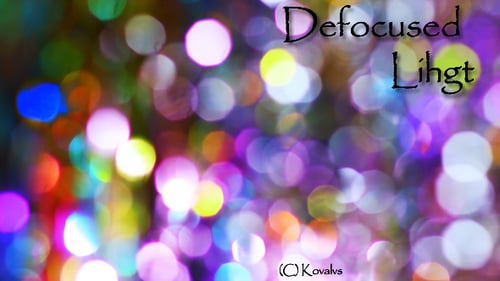 Colorful Glitter Shimmering in Abstract Bokeh