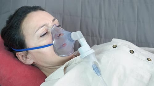 Woman Make Inhalations