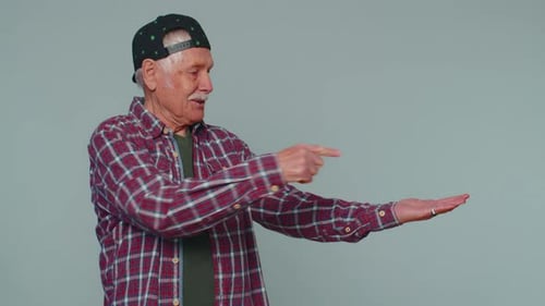 Man Pointing Empty Place Advertising Area for Commercial Text Copy Space for Goods Promotion