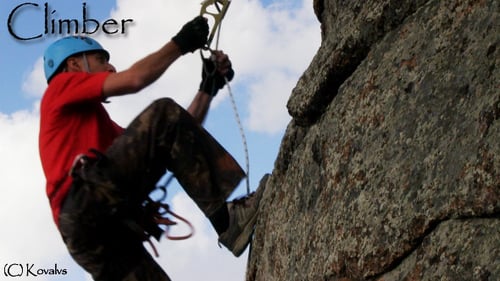 Climber On The Cliff