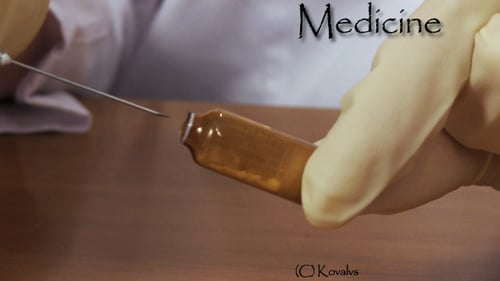 Hypodermic Needle Extracting Substance from Medical Vial