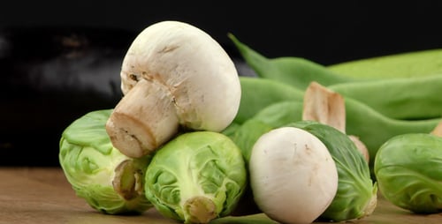 Fresh Vegetables Arranged on a Wooden Surface