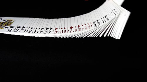 Playing Cards Spread Out On Black Background