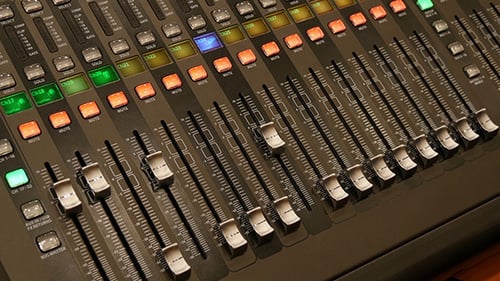 Audio Mixing Console Buttons and Faders Close Up