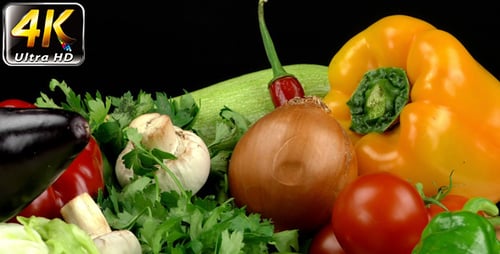 Fresh Vegetables Rotating on a Black Background