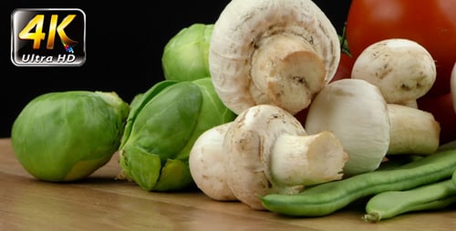 Variety of fresh vegetables on a wood surface