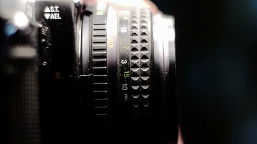 Silver Camera Lens Adjustment and Activation Macro Shot