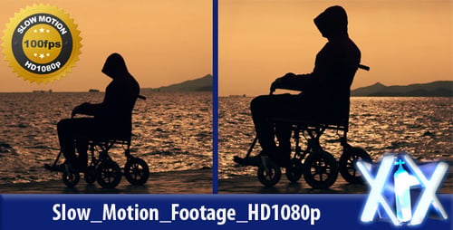 Person in Wheelchair Watching Sunset at the Beach